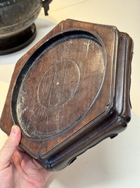 A Chinese archaistic bronze censer with 'chilong' and 'lingzhi' handles on wooden stand, Zhou Wang Bo Zuo Bao Ding 周王伯作寶鼎 mark, Yuan/Ming