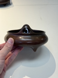 A Chinese bronze tripod censer, Xuande mark, 17/18th C.