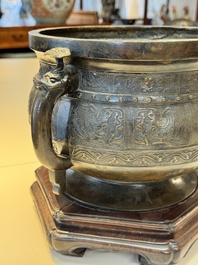 A Chinese archaistic bronze censer with 'chilong' and 'lingzhi' handles on wooden stand, Zhou Wang Bo Zuo Bao Ding 周王伯作寶鼎 mark, Yuan/Ming