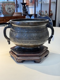 A Chinese archaistic bronze censer with 'chilong' and 'lingzhi' handles on wooden stand, Zhou Wang Bo Zuo Bao Ding 周王伯作寶鼎 mark, Yuan/Ming