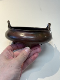 A Chinese bronze tripod censer, Xuande mark, 17/18th C.