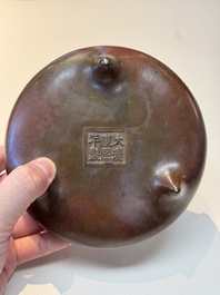 A Chinese bronze tripod censer, Xuande mark, 17/18th C.