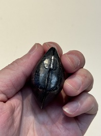 A small Chinese silver clam-shaped box with animals design, Tang/Song
