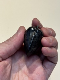 A small Chinese silver clam-shaped box with animals design, Tang/Song
