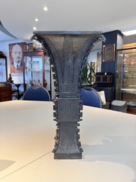 A Chinese bronze 'zun' vase with taotie design, Ming