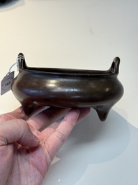 A Chinese bronze tripod censer, Xuande mark, 17/18th C.
