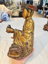 A set of three Chinese or Vietnamese gilt-lacquered wooden sculptures of Buddha, 18/19th C.