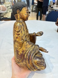 A set of three Chinese or Vietnamese gilt-lacquered wooden sculptures of Buddha, 18/19th C.