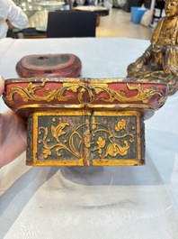 A set of three Chinese or Vietnamese gilt-lacquered wooden sculptures of Buddha, 18/19th C.