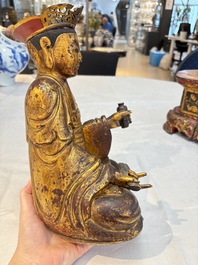 A set of three Chinese or Vietnamese gilt-lacquered wooden sculptures of Buddha, 18/19th C.