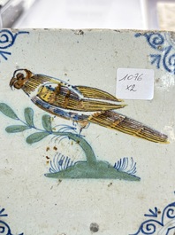 Two polychrome Dutch Delft 'bird' tiles, 17th C.