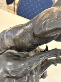 A Japanese bronze okimono of a tiger and a bull, signed Sano Takachika 佐野隆親, Meiji, 19th C.