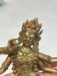 A Nepalese or Tibetan turquoise-inlaid gilt-bronze sculpture of Kurukulla or Red Tara, 15th C. or later