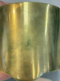 A Chinese bronze cylindrical tripod censer, Xuande mark, 18th C.