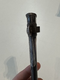 A Caucasian walrus bone-hilted kindjal with niello silver mounts, 19th C.