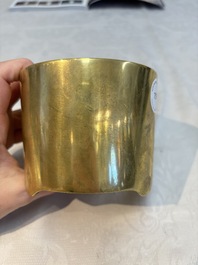 A Chinese bronze cylindrical tripod censer, Xuande mark, 18th C.