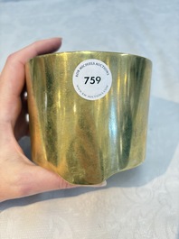 A Chinese bronze cylindrical tripod censer, Xuande mark, 18th C.