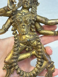 A Nepalese or Tibetan turquoise-inlaid gilt-bronze sculpture of Kurukulla or Red Tara, 15th C. or later