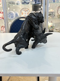 A Japanese bronze okimono of a tiger and a bull, signed Sano Takachika 佐野隆親, Meiji, 19th C.