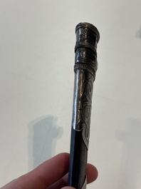 A Caucasian walrus bone-hilted kindjal with niello silver mounts, 19th C.