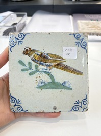 Two polychrome Dutch Delft 'bird' tiles, 17th C.