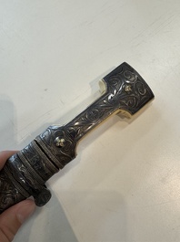 A Caucasian walrus bone-hilted kindjal with niello silver mounts, 19th C.