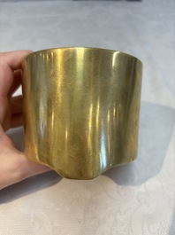 A Chinese bronze cylindrical tripod censer, Xuande mark, 18th C.