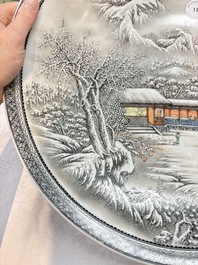 A large Chinese 'winter landscape' dish in the style of He Xuren 何許人, signed Rao Yongchang 饒永昌, dated 1902
