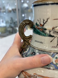 A pair of Chinese famille verte vases with narrative design, 19th C.