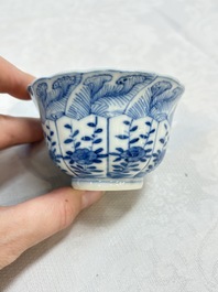 A set of four Chinese blue and white cups and saucers, flower mark, 19th C.