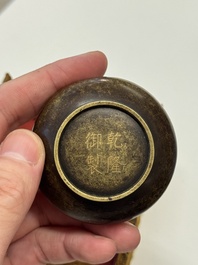 A Chinese gilt and silver inlaid bronze ink paste box and cover and with presentation box, Qianlong mark and possibly of the period