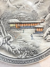 A large Chinese 'winter landscape' dish in the style of He Xuren 何許人, signed Rao Yongchang 饒永昌, dated 1902