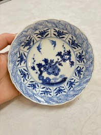 A set of four Chinese blue and white cups and saucers, flower mark, 19th C.