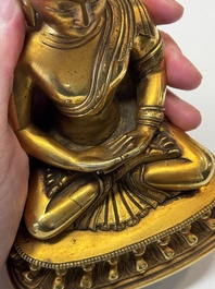 A fine Sino-Tibetan gilt-bronze figure of Buddha Shakyamuni, 17th C.