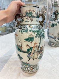 A pair of Chinese famille verte vases with narrative design, 19th C.