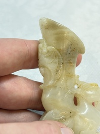 Two Chinese celadon, white and russet jade carvings, 18/19th C.