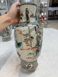 A pair of Chinese famille verte vases with narrative design, 19th C.