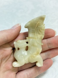 Two Chinese celadon, white and russet jade carvings, 18/19th C.