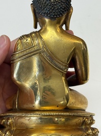 A fine Sino-Tibetan gilt-bronze figure of Buddha Shakyamuni, 17th C.