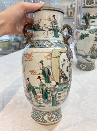 A pair of Chinese famille verte vases with narrative design, 19th C.