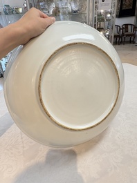 A large Chinese 'winter landscape' dish in the style of He Xuren 何許人, signed Rao Yongchang 饒永昌, dated 1902