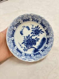 A set of four Chinese blue and white cups and saucers, flower mark, 19th C.