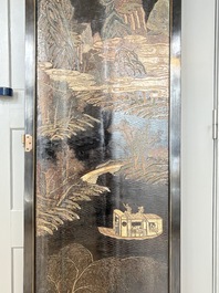 A Chinese Coromandel lacquered four-panel folding screen with mountainous landscapes, 17/18th C.