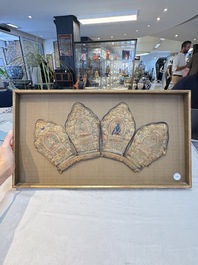 A framed Tibetan silk-embroidered four-leaf ritual crown with Transcendent Buddhas, Tibet, 18th C.