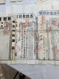 A large collection of 14 Chinese title deeds, 11 share applications, and a land law manual, 19/20th C.
