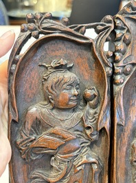 A Chinese carved wooden triptych panel with figural design, Wong Chan Kee mark, Shanghai, 20th C.