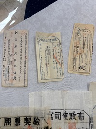 A large collection of 14 Chinese title deeds, 11 share applications, and a land law manual, 19/20th C.