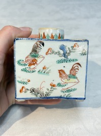 A pair of Chinese famille verte rectangular tea caddies and covers with fighting roosters, Kangxi