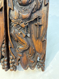 A Chinese carved wooden triptych panel with figural design, Wong Chan Kee mark, Shanghai, 20th C.