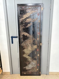 A Chinese Coromandel lacquered four-panel folding screen with mountainous landscapes, 17/18th C.